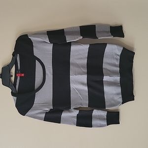 A small black and gray striped sweater